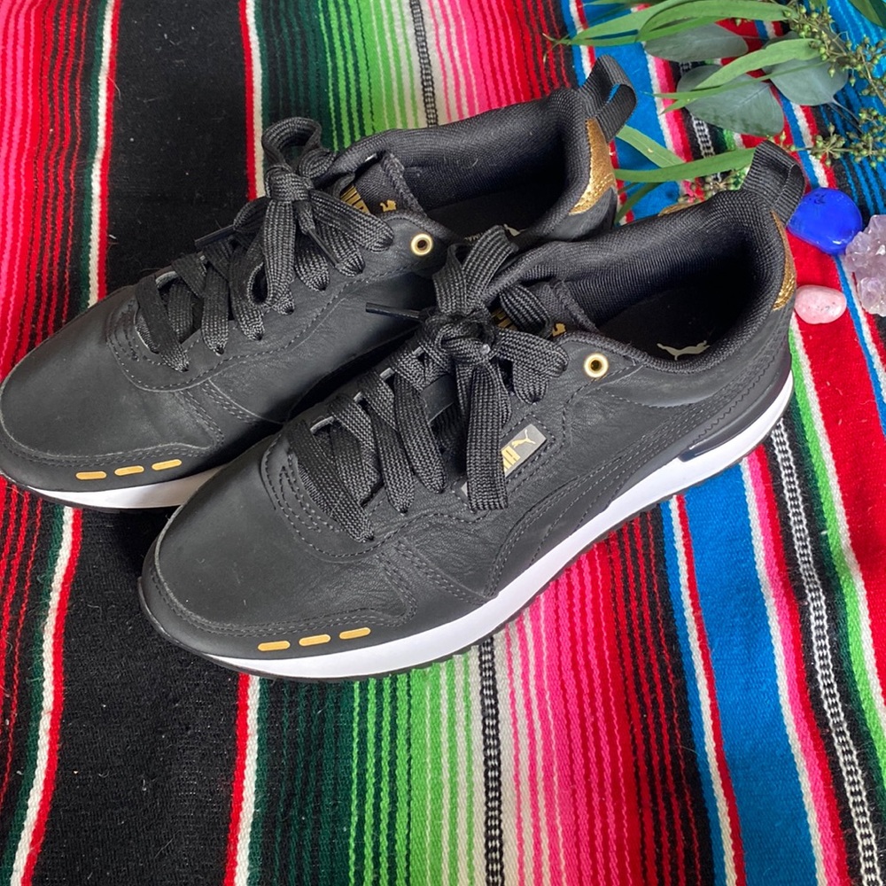 Black and Gold Puma SoftFoam Sneakers